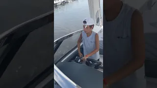 12 year old docking a 34 ft boat twin screws, old school.