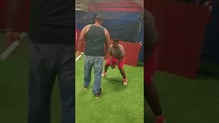 NFLer All Pro Lineman Jonathan Scott teaching Sebastian Blunt