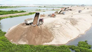 Great Huge Sand Filling Up Process Wheel Loader Bulldozer Spreading Sand Dirt Rock Into Water