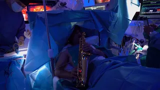 Patient plays saxophone during brain surgery in Italy