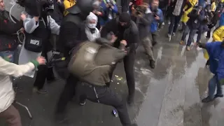 Riot police clash with protesters outside Georgian parliament