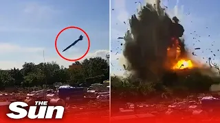 Russian missile caught on CCTV just before it slams into a Ukrainian shopping killing at least 20