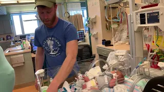 Josh changing Jesse’s diaper