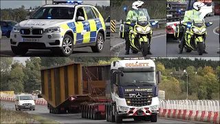 Bridge girders escorted by police take up road before lifting into place with massive crane 🌉