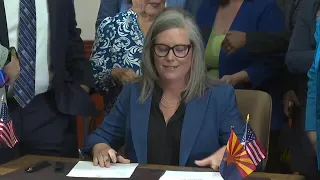 Arizona governor's signing of abortion law repeal follows political fight by women lawmakers