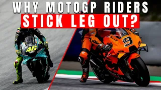 Why motogp riders stick leg out?