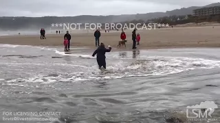 01-27-2018 Cannon Beach, Oregon - Sneaker Wave Engulfs Beachgoers