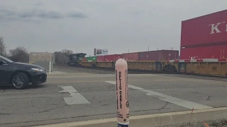 A short fast eastbound NS intermodal  at sunny lane crossing in dunlap, IN