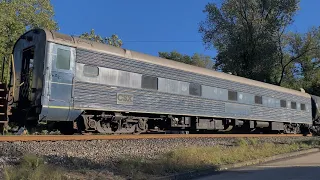 One of CSX’s Old Office Cars on Q404, and UP leader!