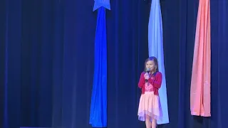 My little sweetheart singing Girl on Fire in the talent show. Age 7
