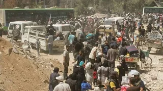 First evacuees escape war-torn Daraya