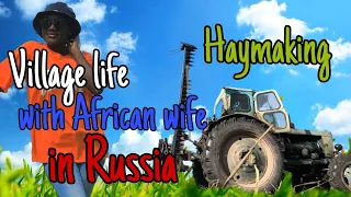African wife in a Russian village ✰ Haymaking
