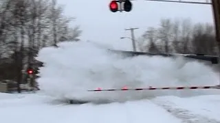 80MPH Amtrak trains plowing snow