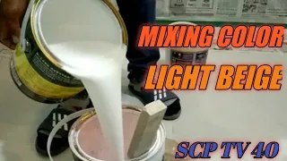 mixing a color light beige, acrytex primer white w/ oil tinting color raw sienna..SCP TV 40....