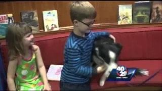 Dogs help kids practice reading