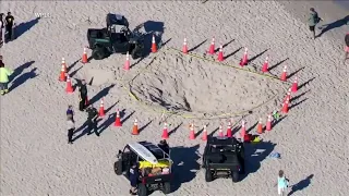 Child dies after siblings fall into 6-foot hole on Florida beach