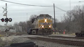 Union Pacific big special maintance train goes northbound at tower 26
