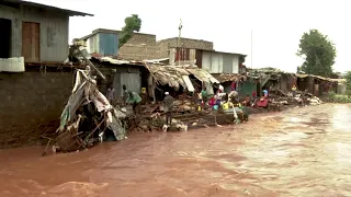 Villagers mourn after people swept away by river in Kenya | REUTERS