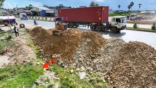 Newly built construction side pushes land on both sides of the road near sewer 40m & 5-ton trucks