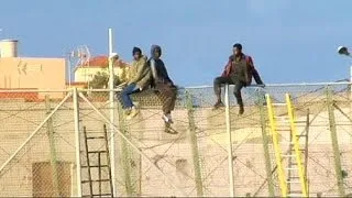 Migrants charge Spain's Melilla enclave