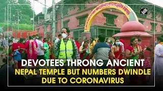 Devotees throng ancient Nepal temple but numbers dwindle due to coronavirus