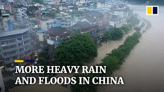 Heavy rain in China forces thousands to evacuate as deluge causes flooding and landslides