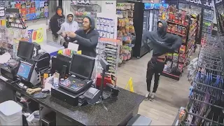 Clerk bombarded by 4 gunmen during robbery at SW Houston gas station, video shows