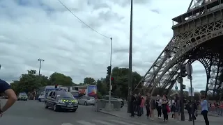 Police Motorcycle Heavily Armed Escort Banque de France Money Transfer passing Tour Eiffel