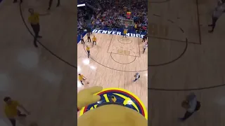 Mascot makes half court shot on a 30ft. ladder