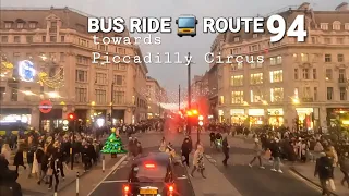 Exploring London's Festive Season: Riding Route 94 on a Red Double-Decker Bus