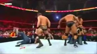 Batista returns 2009 and save Triple H   YouTube