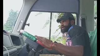 Highland bus driver.. driving kiunga tabubil Highway Papua New Guinea