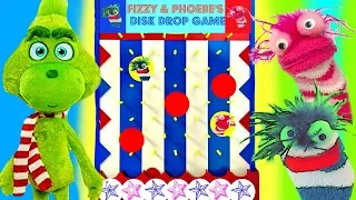 The Grinch Plays Fizzy and Phoebe Disk Drop Game