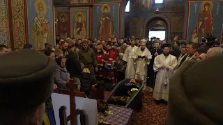 Family, Zelenskyy attend funeral of killed commander