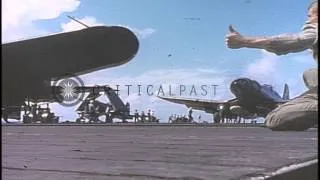 Damaged TBM Avenger jettisoned from US Aircraft Carrier deck into Pacific Ocean a...HD Stock Footage