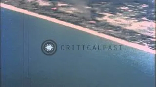 Strafing of Tarumizo, Kyushu, Japan by the United States Army Air Force during Wo...HD Stock Footage