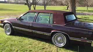 A 4/20 Morning With My Sunshine A 1993 Cadillac Sedan Deville On Wire Rims.