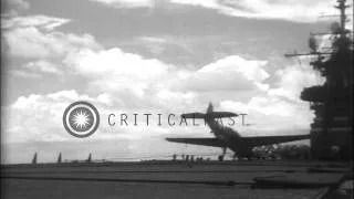 Slow motion images of TBF Avenger aircraft nosing over during landing on USS Bunk...HD Stock Footage