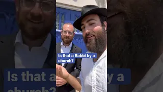 Is that a Rabbi by a church?