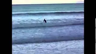 Tom and Will Curran surfing Muizenberg