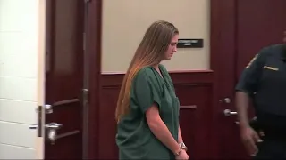 Woman hit with 8 new charges in alleged road rage murder