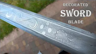 Forging a Viking age sword with decorated blade. Blacksmithing