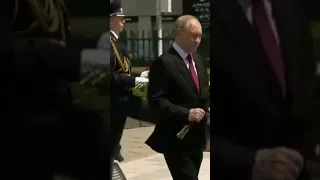 President Vladimir Putin lays flowers at WWII memorial in Harbin during state  visit to China