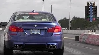 BMW M5 BiTurbo V8 vs Tuned BMW 335 is Turbo - 1/4 mile Drag Race Video - Road Test TV ®