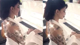 Jacqueline Fernandez PLAYING The Piano | Looks AMAZING!