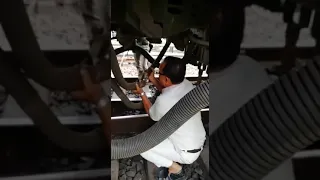 Train moves while guard under wheel coupling brake