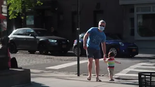 Andy Cohen walks his young son Ben in the West Village during the Pandemic in NYC