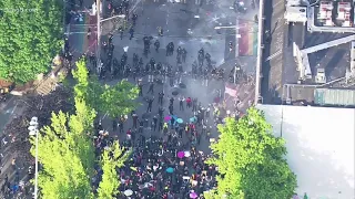 Seattle police clash with protesters in Capitol Hill as they try to disperse the crowd