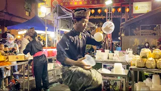 Amazing Coconut Ball Street Performance at Jonker Street Melacca, Malaysia