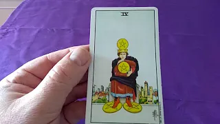 Four of pentacles Tarot card meaning.